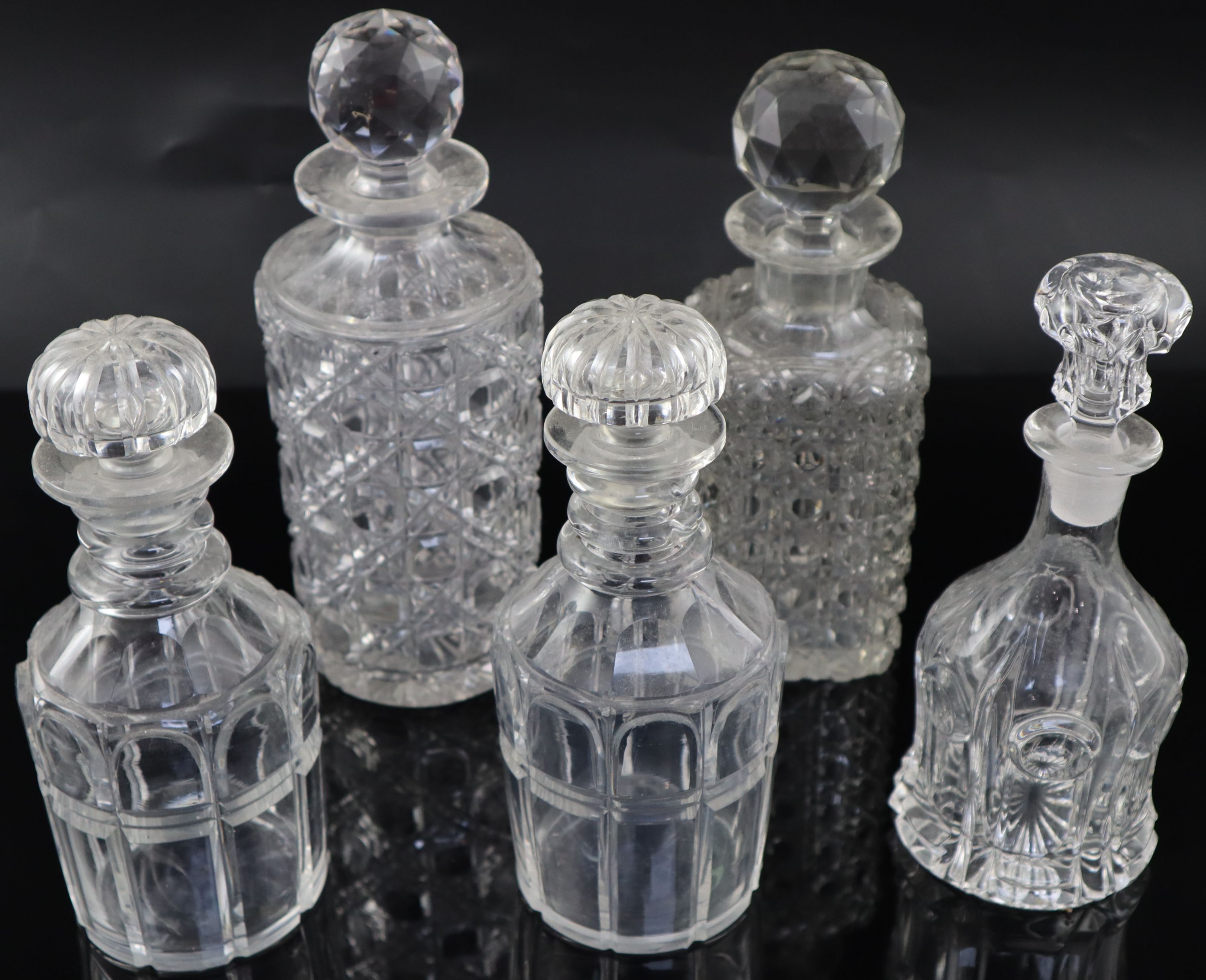 Five assorted Victorian and later cut glass decanters